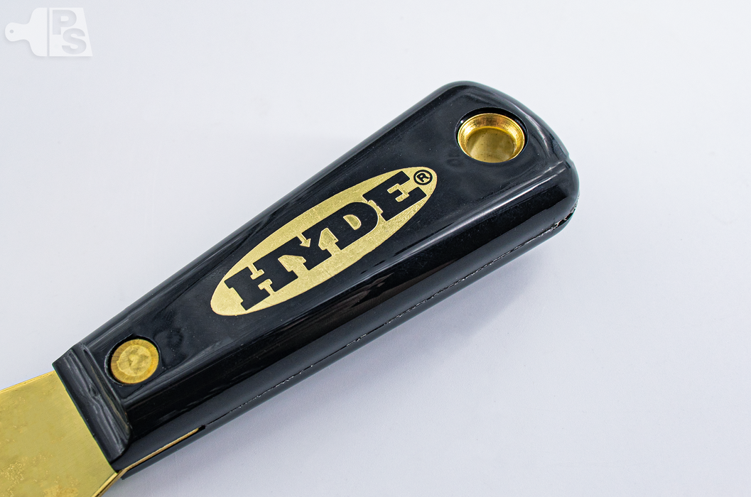Hyde 2 inch black and silver brass blade stiff putty knife - close up 2